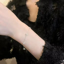 <tc>Vierblättriges Blumenarmband mit Zirkon</tc>